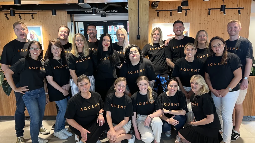 Most of our Aquent team in Aquent t-shirts