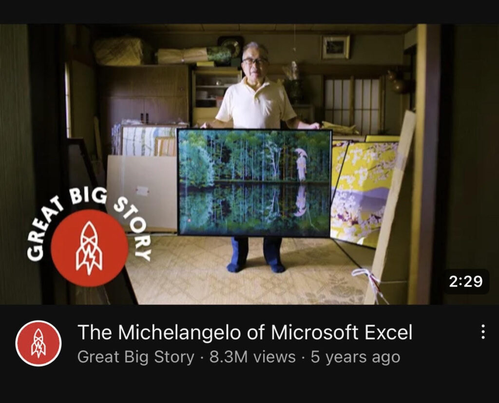 screenshot of man holding up prints. Copy says "The Michaelangelo of Microsoft Excel" - Great Big S
tory.